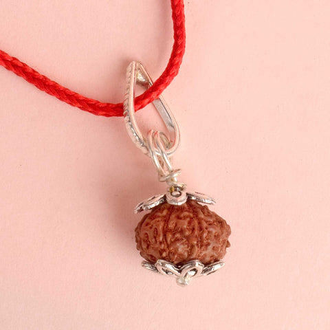 Certified 9 Mukhi Rudraksha Pendant with metal capping for power and protection. India’s Premium Rudraksha Jap Mala Store- www.satvikstore.in