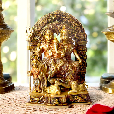 This beautifully crafted Brass Sampurna Shiv Parivaar Idol showcases the divine family of Lord Shiva, featuring Lord Shiva, Goddess Parvati, Lord Ganesha, and Lord Kartikeya. Expertly designed in fine brass, this idol symbolizes unity, love, and divine blessings, making it an ideal addition to any home or temple space. India's Largest Puja Accessories Brand - Satvik