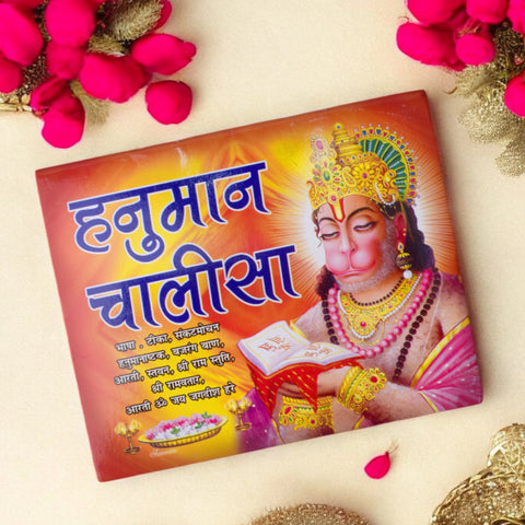 Front cover of the Hanuman Chalisa Book in Hindi featuring Lord Hanuman, with sacred verses, puja vidhi, and devotional illustrations. India’s Largest Pooja Accessories Brand – www.satvikstore.in
